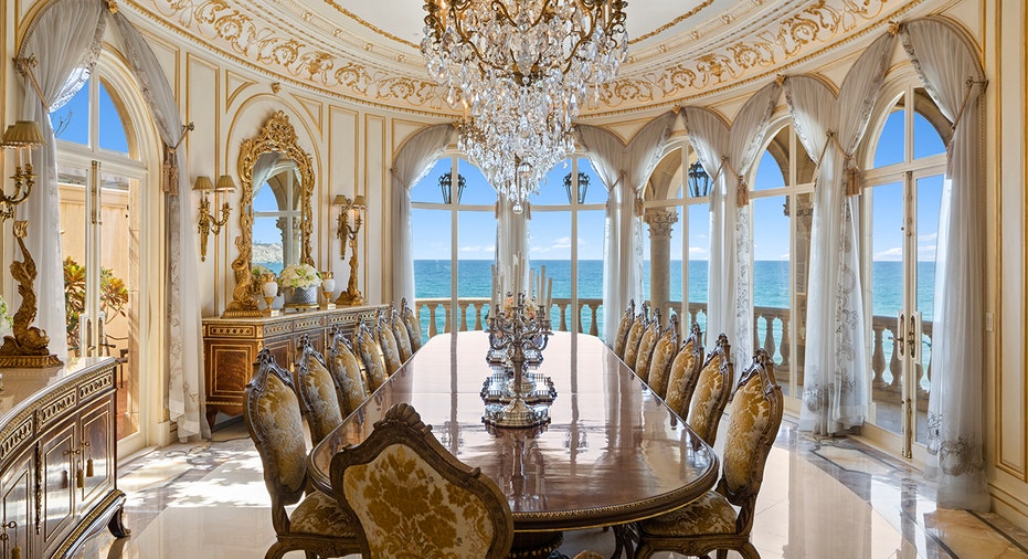 A 19th Century chandelier hangs above the dining room table