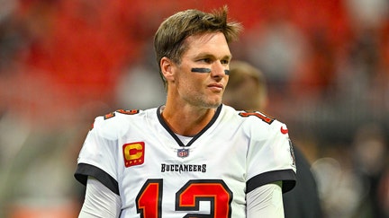 Tampa Bay quarterback Tom Brady warms up prior to the start of the NFL game between the Tampa Bay Buccaneers and the Atlanta Falcons on Jan. 8, 2023, at Mercedes-Benz Stadium in Atlanta. 