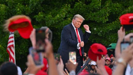 Former U.S. President Donald Trump dances at his campaign rally at Crotona Park in the South Bronx on Thursday, May 23, 2024 in New York City. 